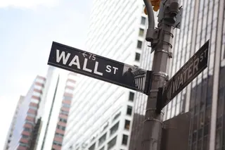 Wall Street Melemah Usai The Fed Memutuskan untuk Menahan Suku Bunga Acuan